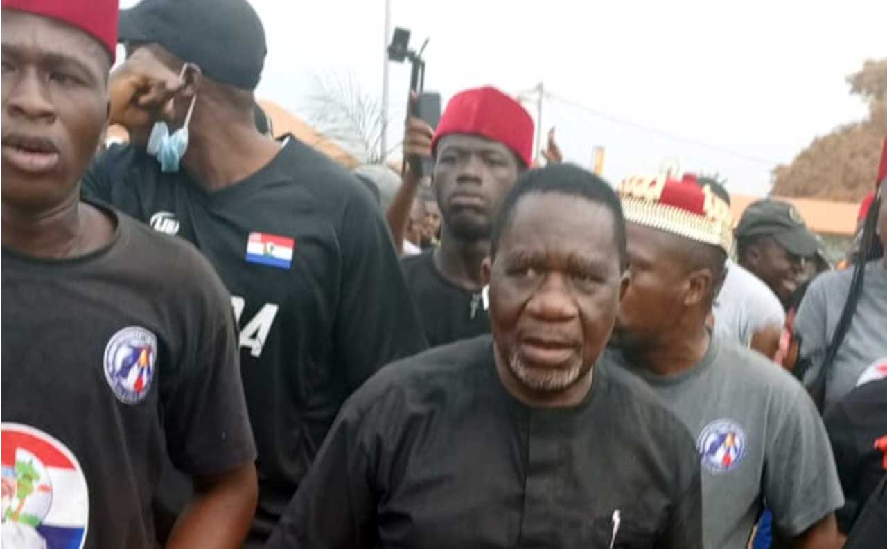 National-Chairman-Kruah,-leads-the-parade-with-partisans,-at-the-funeral-of-the-fallen-Party-Founder,-late-Senator-Johnson-in-Ganta