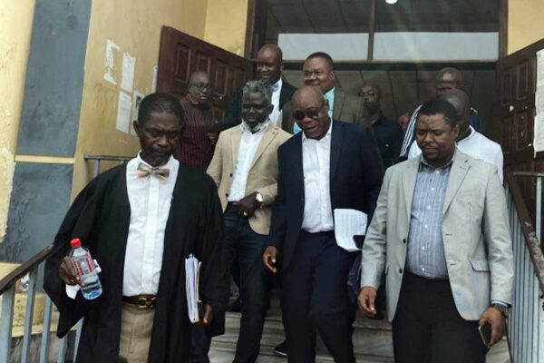 Former-Finance-Minister-Samuel-Tweh-Captured-Leaving-Court-From-With-Legal-Team