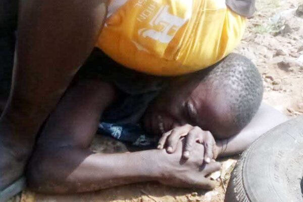 Man-Captured-sitting-On-top-of--Boys-Head-Nine-Year-Old-Subjected-To-Inhumane-Treatment