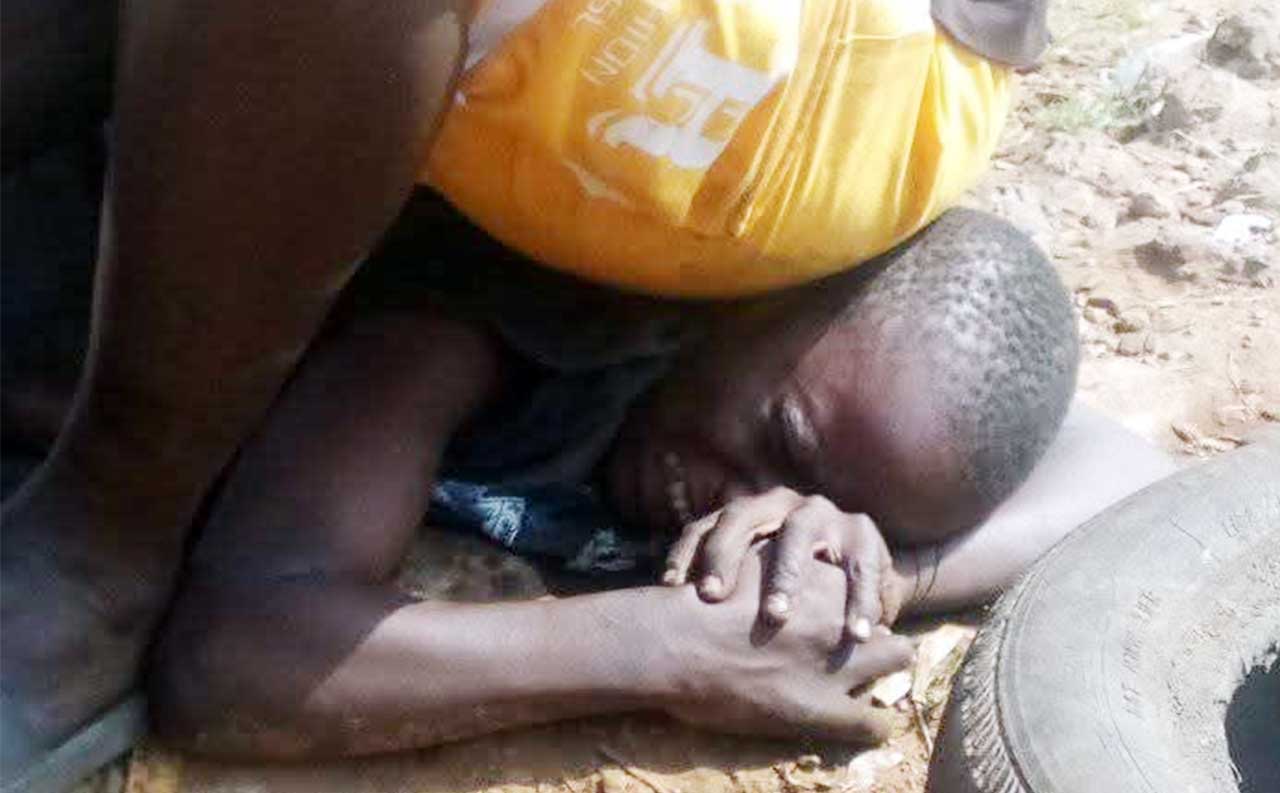 Man-Captured-sitting-On-top-of--Boys-Head-Nine-Year-Old-Subjected-To-Inhumane-Treatment