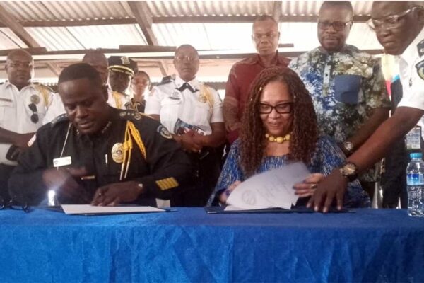 Police, Cuttington University Establish Partnership …Sign MOU Police-Chief-Gregory-Coleman,-Cuttington-University-President-Sign-MOU