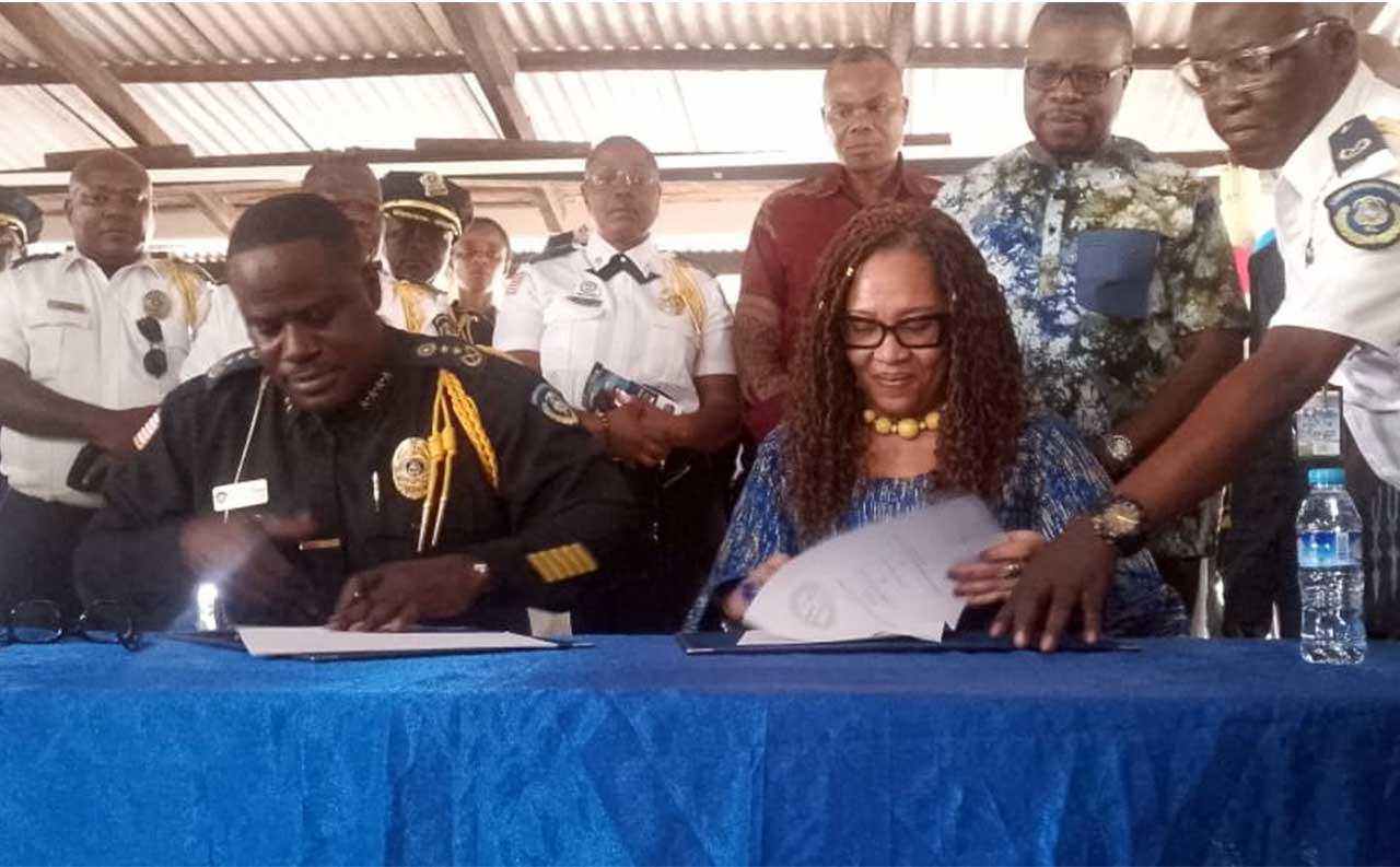 Police-Chief-Gregory-Coleman,-Cuttington-University-President-Sign-MOU