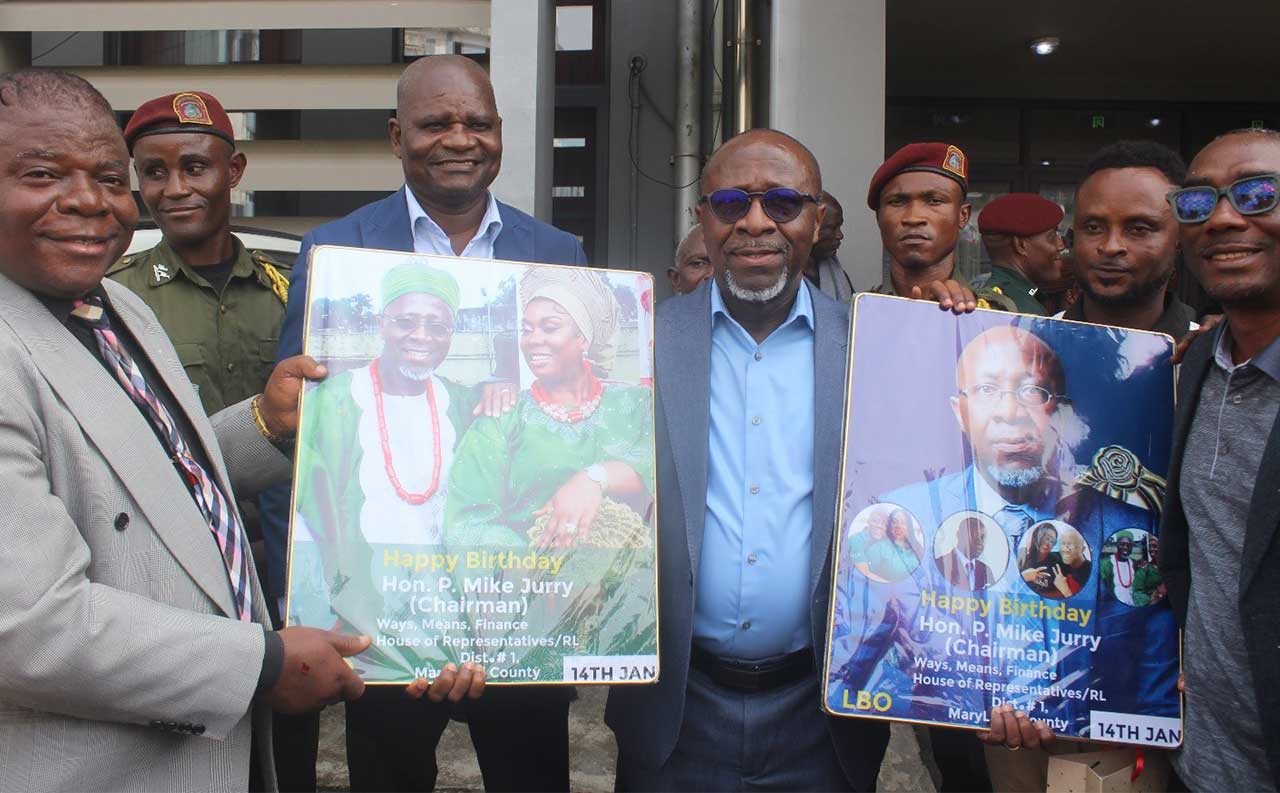 Representative-Mike-Jurry-Displays-Birthday-Presents
